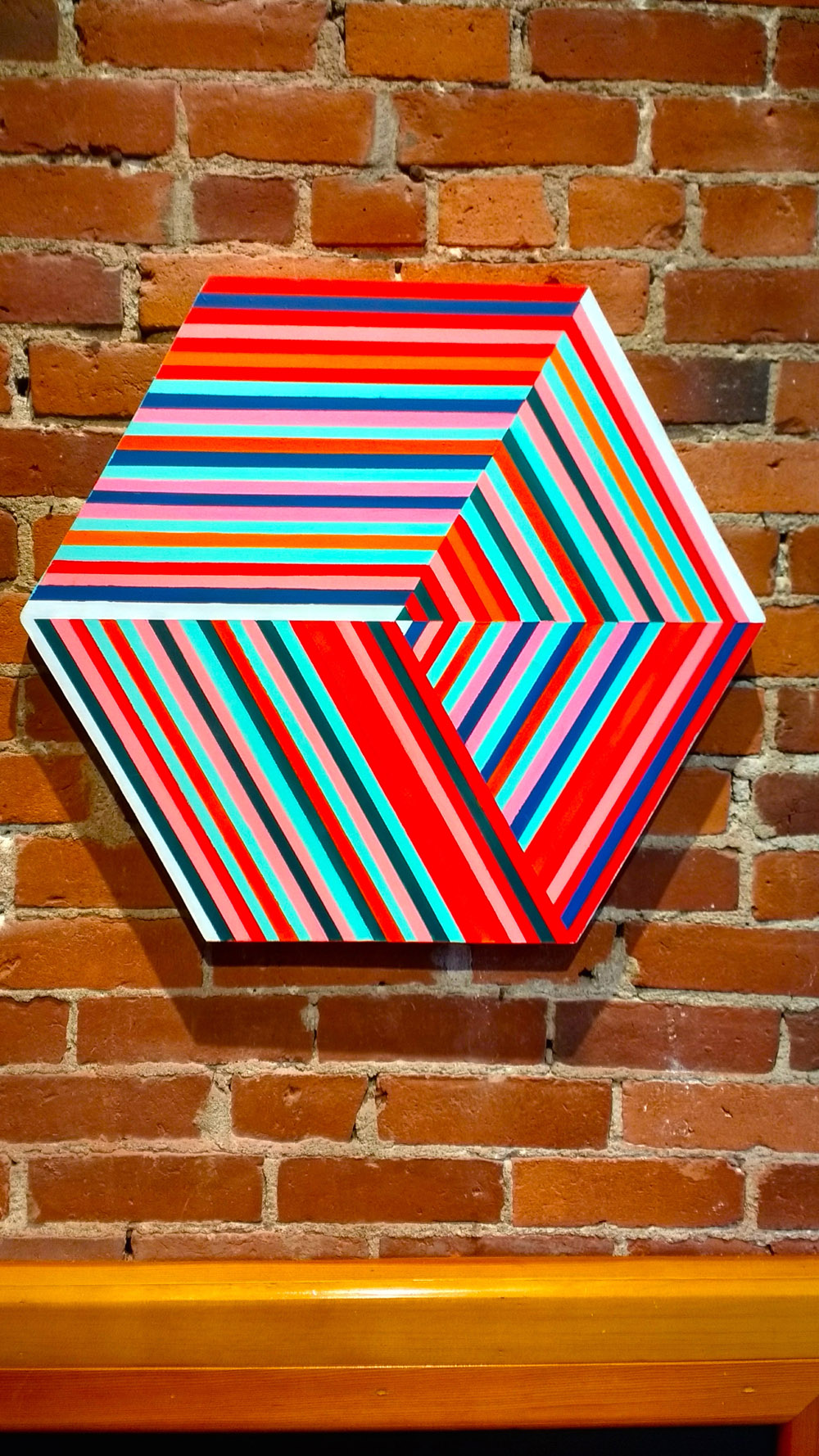 coloful op art hanging in gallery